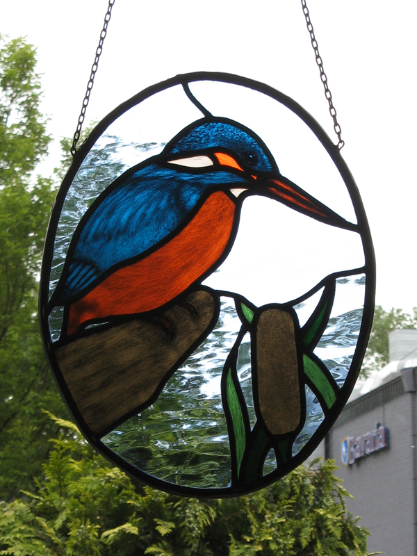 Glas-in-lood gebrandschilderde ijsvogel