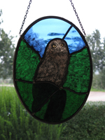 Glas-in-lood hanger met gebrandschilderde uil